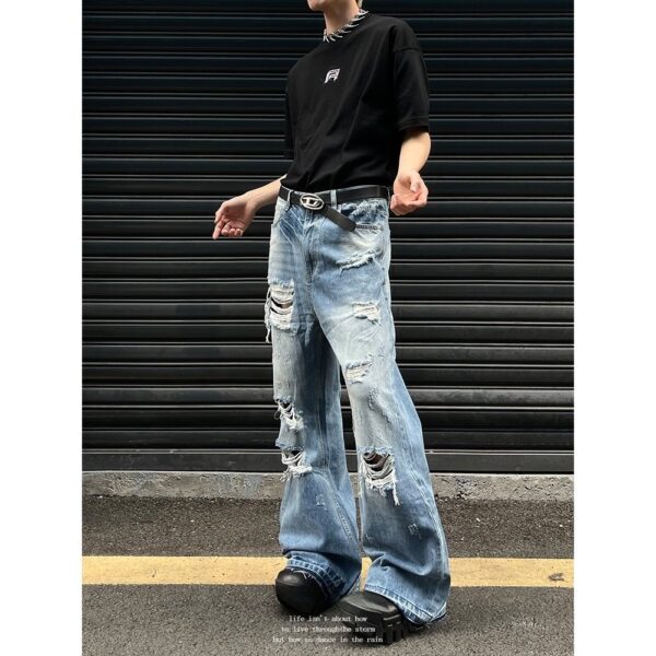 distressed micro flare jeans – 2000s style ripped denim with vintage wash